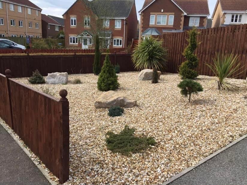 Gravel: Gravel driveway and decorative stone landscaping by JP Driveways & Landscaping: project 5
